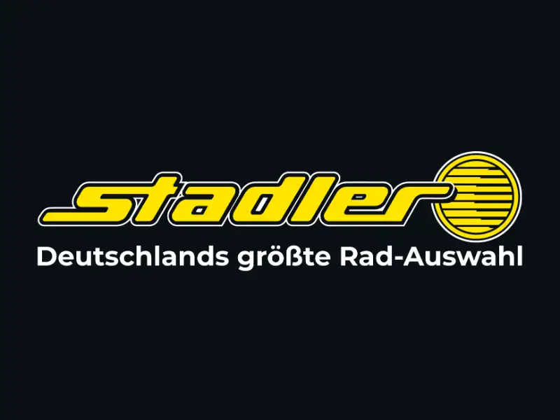 Das Logo von Zweirad Stadler. Gelber Schriftzug mit dem Namen "Stadler" und darunter der Text "Deutschlands größte Rad-Auswahl".